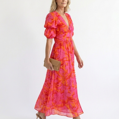 Pink floral V-neck midi dress with puff sleeves and flowing skirt