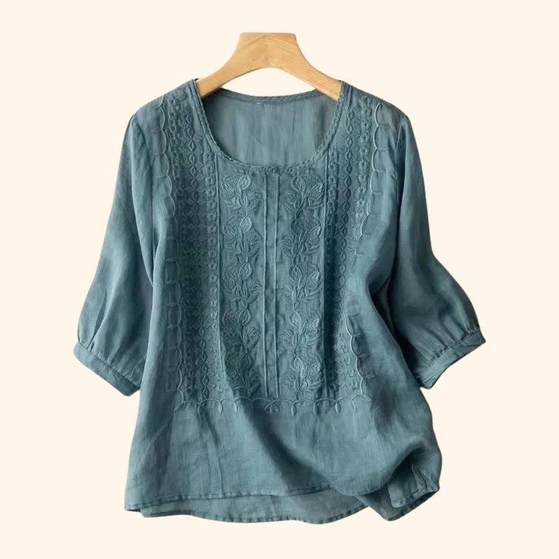 Teal elegant soft blouse with round neck, vertical embroidered front, half sleeves