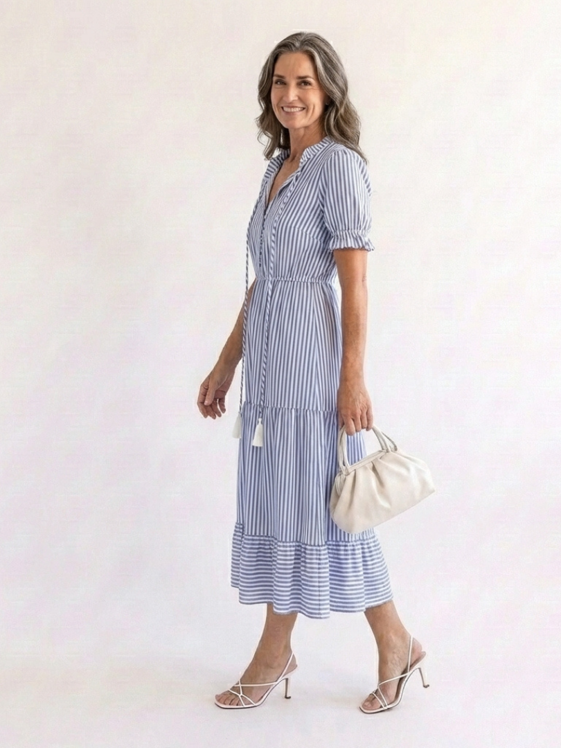 Sky blue striped tiered midi dress, short puff sleeves, V-neck and tassel ties