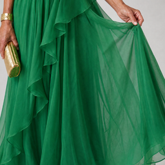 Green one-shoulder maxi dress with tiered ruffles and sheer chiffon skirt overlay