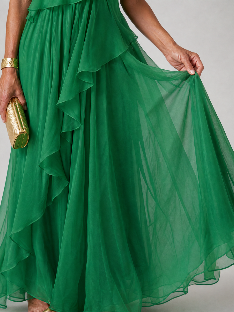 Green one-shoulder maxi dress with tiered ruffles and sheer chiffon skirt overlay