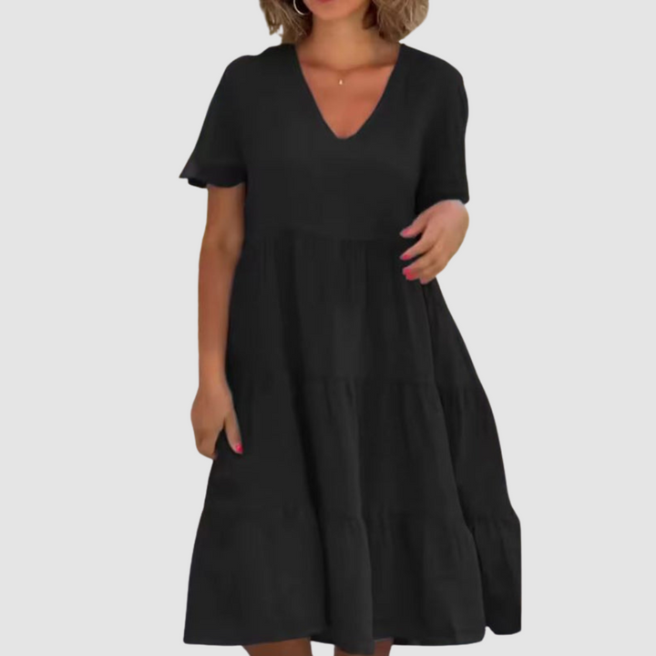 Black V-neck short-sleeve soft dress with tiered ruffle skirt and relaxed A-line cut