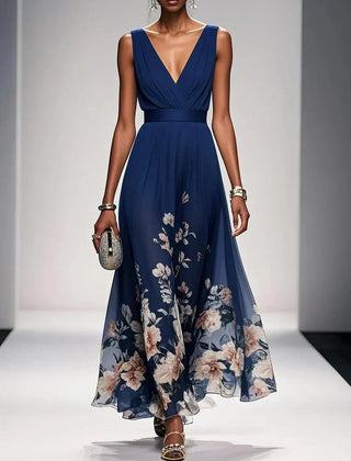 Navy blue sleeveless V-neck floral dress with draped waist and flowing midi skirt