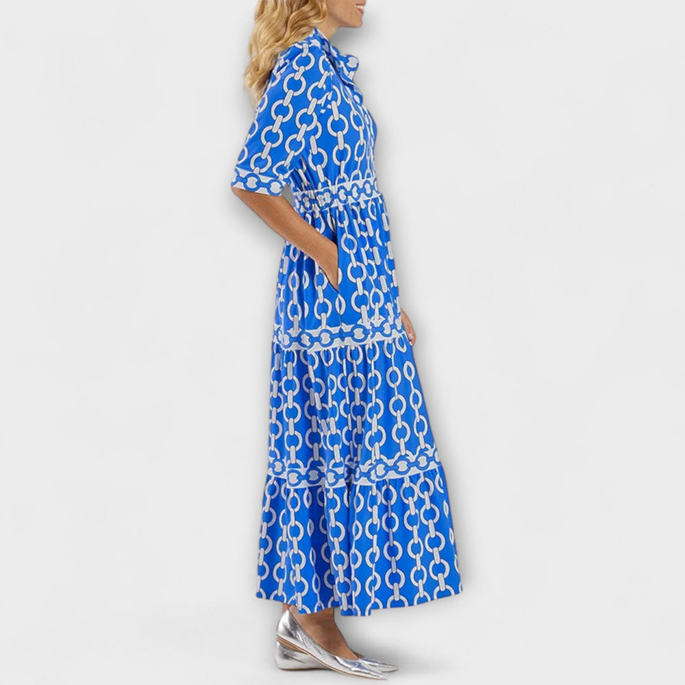 Blue chain-print midi dress with short sleeves and tiered A-line skirt