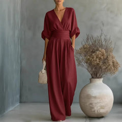 Women’s wide-leg jumpsuit in wine red with V-neck and gathered waist