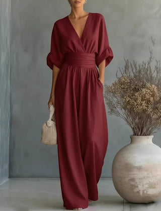 Women’s wide-leg jumpsuit in wine red with V-neck and gathered waist