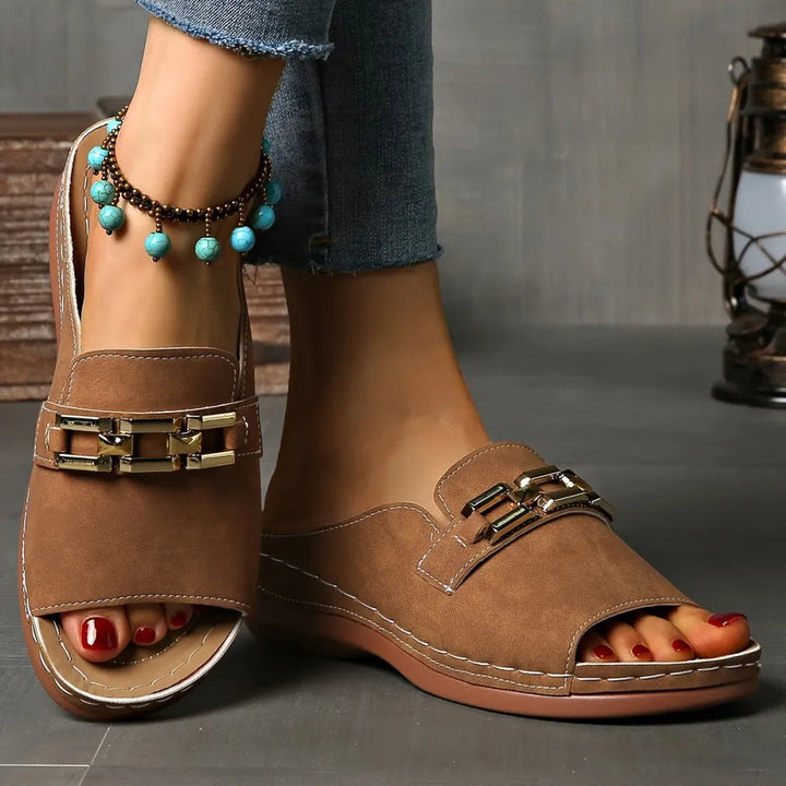 Brown comfort sandals, open toe, gold buckle detail, casual slip-on slide