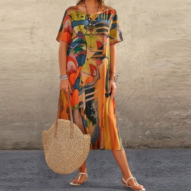 Orange multicolor printed midi dress with short sleeves and scoop neckline