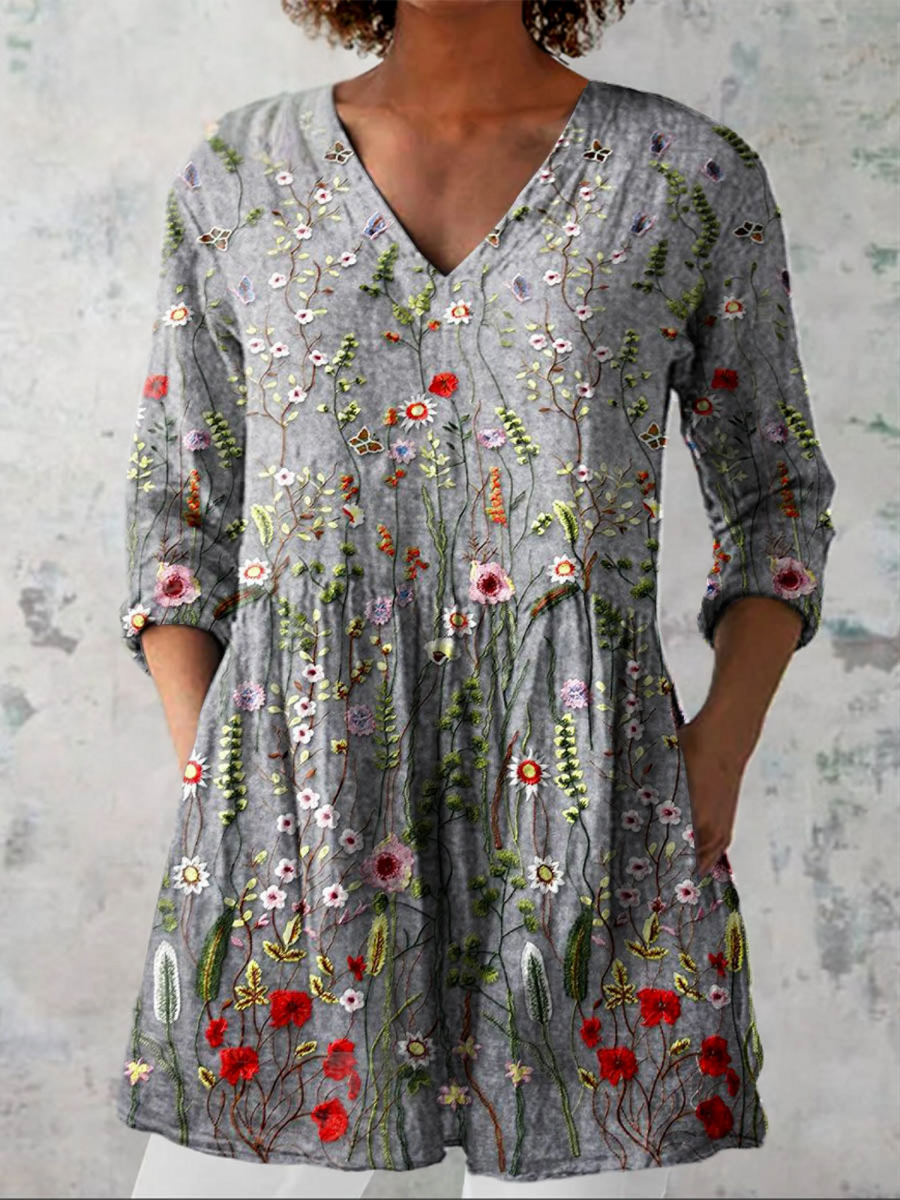 Gray long V-neck blouse with 3/4 sleeves and colorful floral embroidery pattern