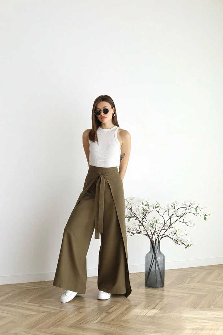 Olive green wide-leg trousers with front waist tie and relaxed wide flared legs