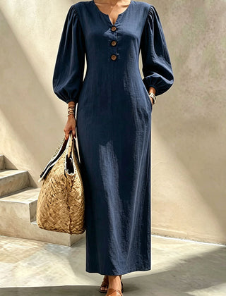 Navy blue v-neck maxi dress with button front and lantern sleeves