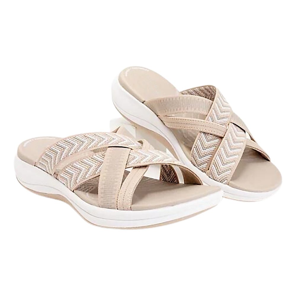 Light beige orthopedic comfort sandals with zigzag upper and open-toe straps.