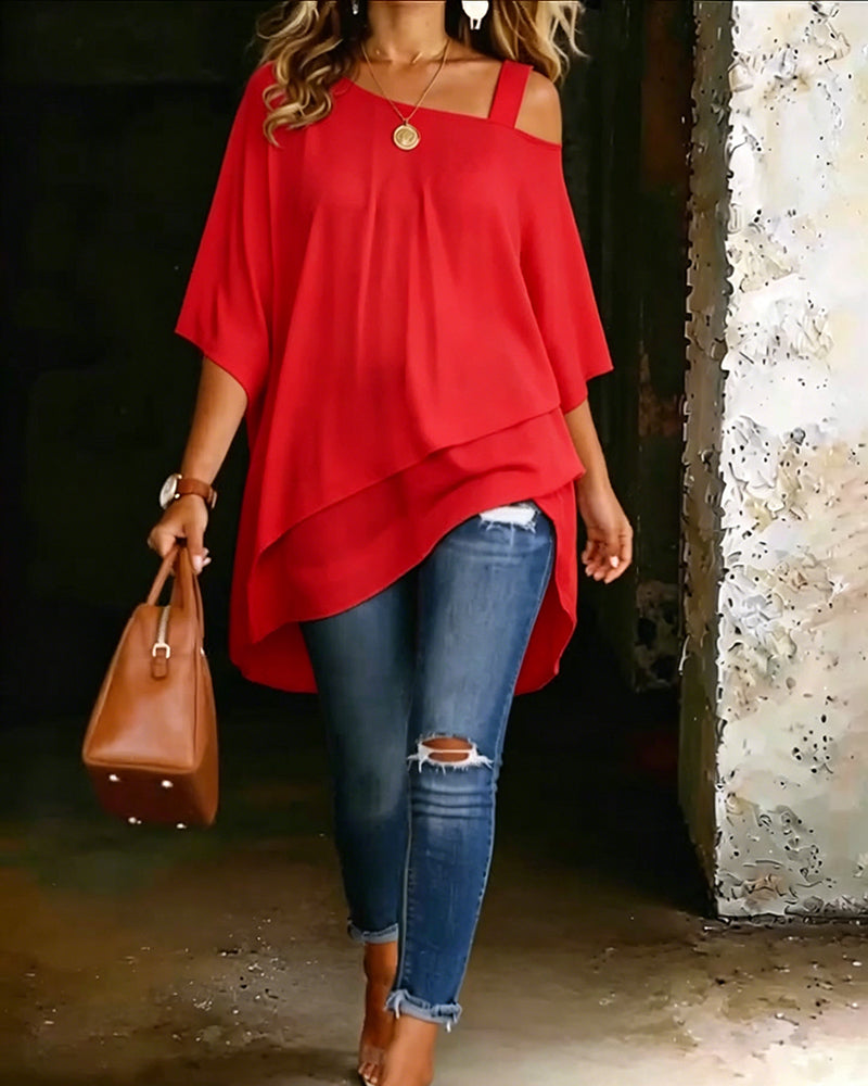 Red asymmetric cold-shoulder blouse with draped layered hem and short sleeves