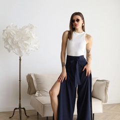 Navy wide-leg trousers with front waist tie and loose, wide silhouette