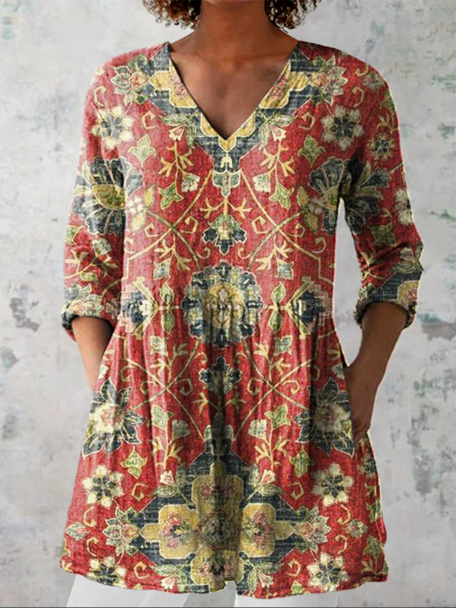 Long-sleeve V-neck blouse with multicolor floral print and gathered waist