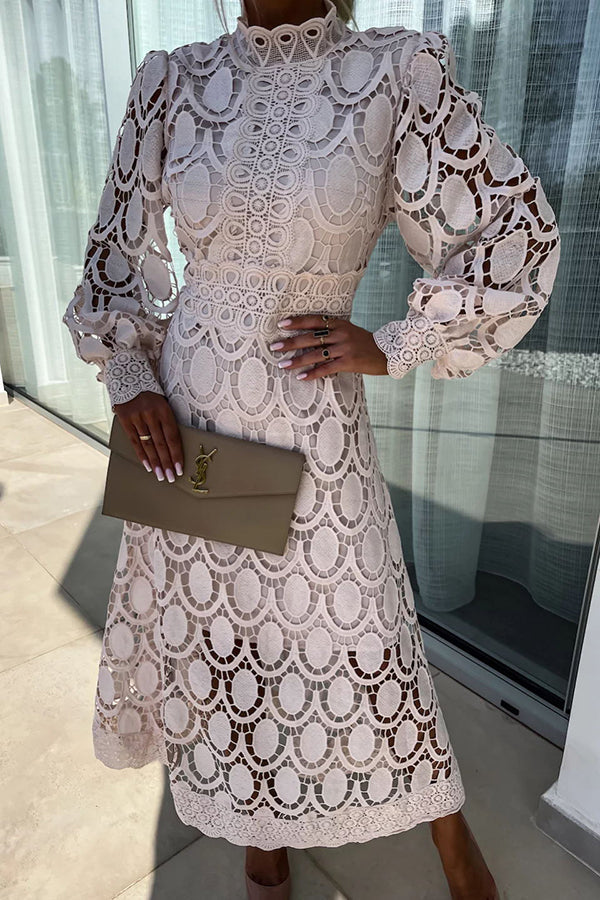 Light pink lace midi dress with high neck, long puff sleeves, scalloped pattern.