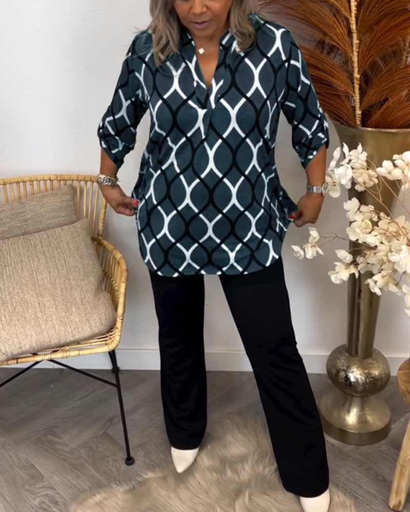 Graphic print tunic blouse, black with white arch trellis pattern, V-neck and sleeves