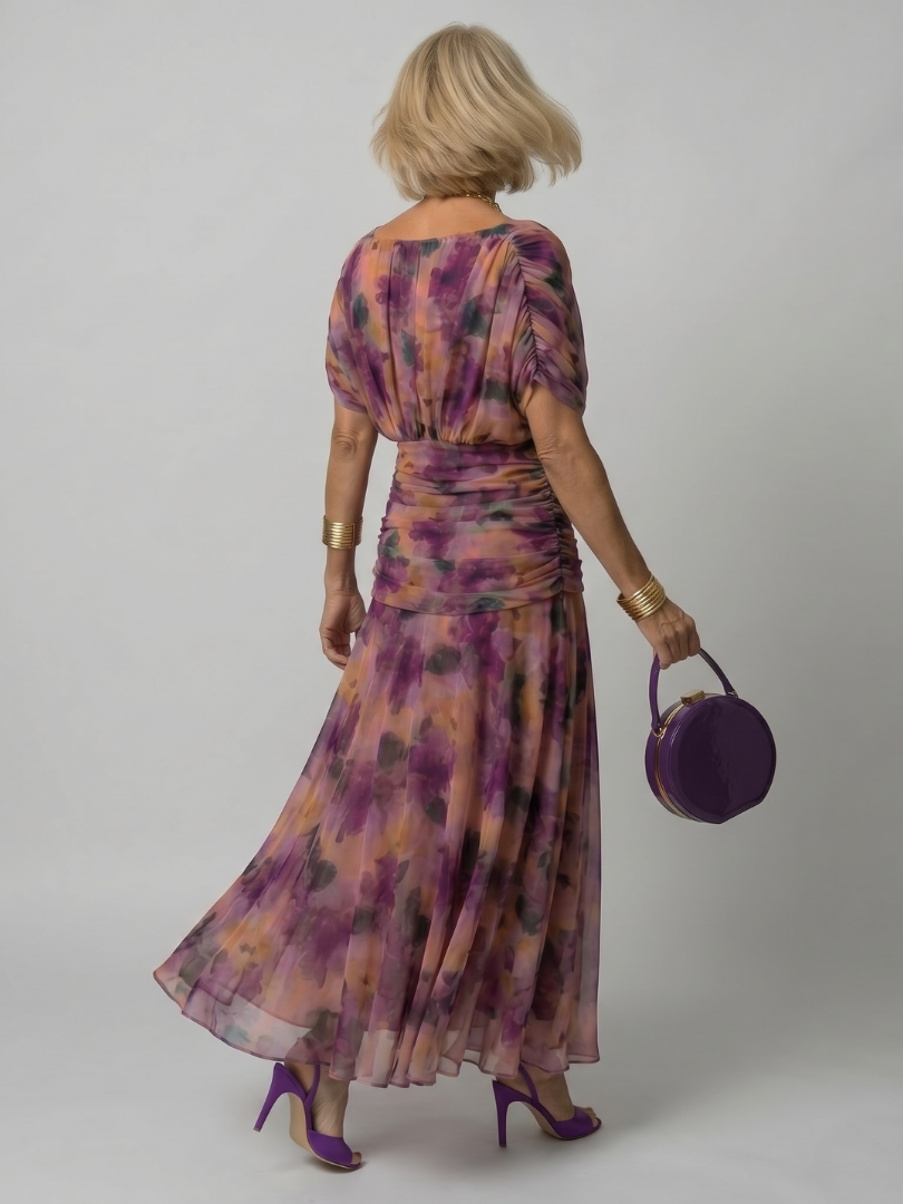 Purple floral off-shoulder flow midi dress from back, elastic waist and full skirt