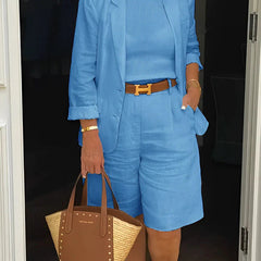Blue two-piece suit set with cropped blazer and matching shorts