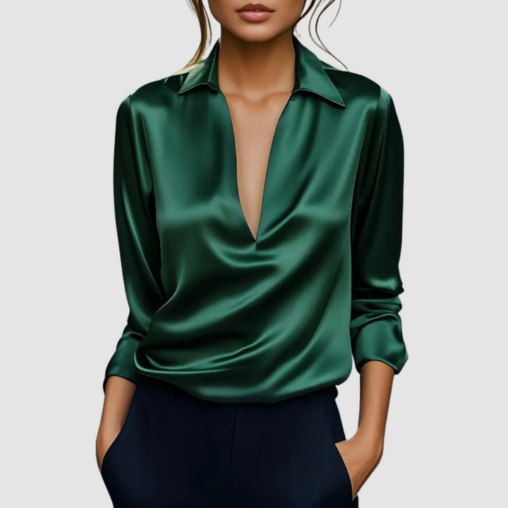 Green satin blouse with V-neck, pointed collar, and 3/4 sleeves.