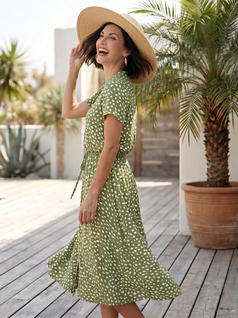 Green printed belted midi dress with short sleeves and button-front detail