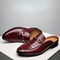 Red croc-embossed leather mules with square toe and metal-link bit strap