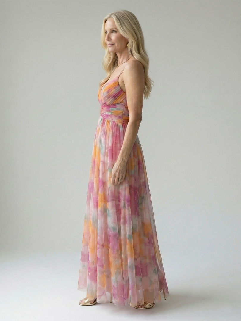 Soft wrap maxi dress in pink, orange and yellow watercolor print, sleeveless, side view