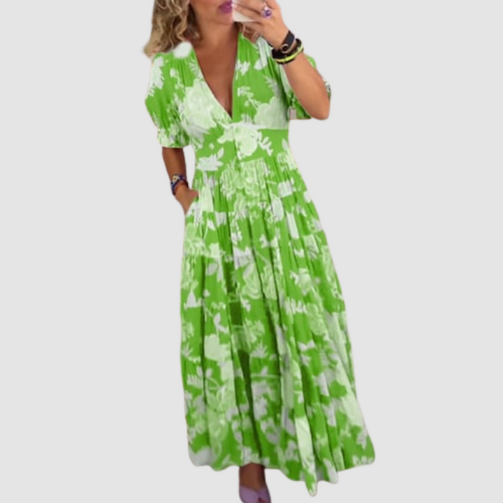 Green floral maxi dress with V-neck and puff sleeves, gathered tiered hem