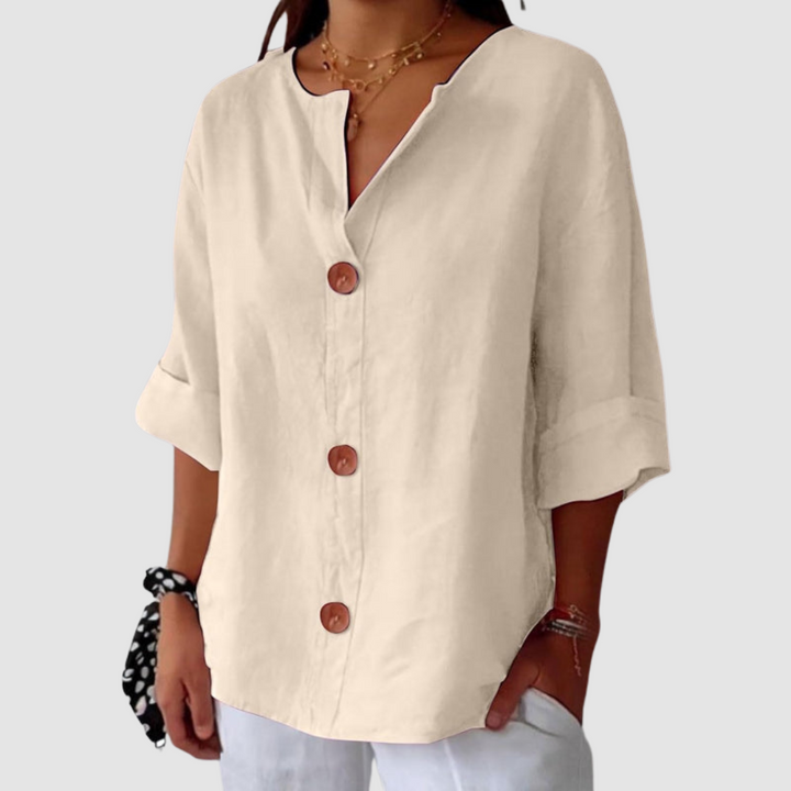 White linen blouse with V-neck and button-front placket, short sleeves
