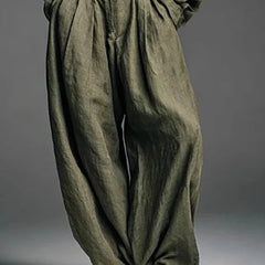 Army green wide-leg pants with gathered waist and buttoned fly, set detail