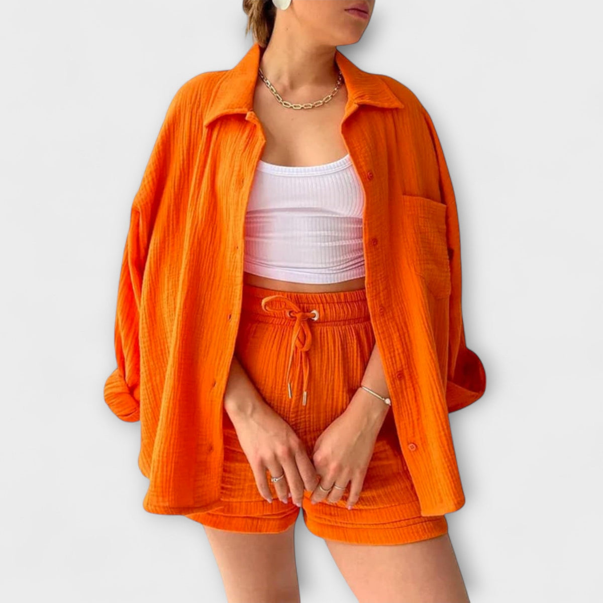 Orange two-piece set: button-front shirt with drawstring-waist shorts
