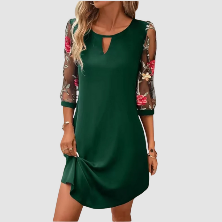 Green floral print summer dress with three-quarter sleeves and keyhole neck cutout