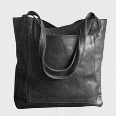 Black leather tote bag with double top handles and front seam detail