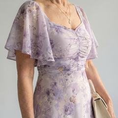 Floral lilac midi dress with ruched bodice and flutter sleeve detail