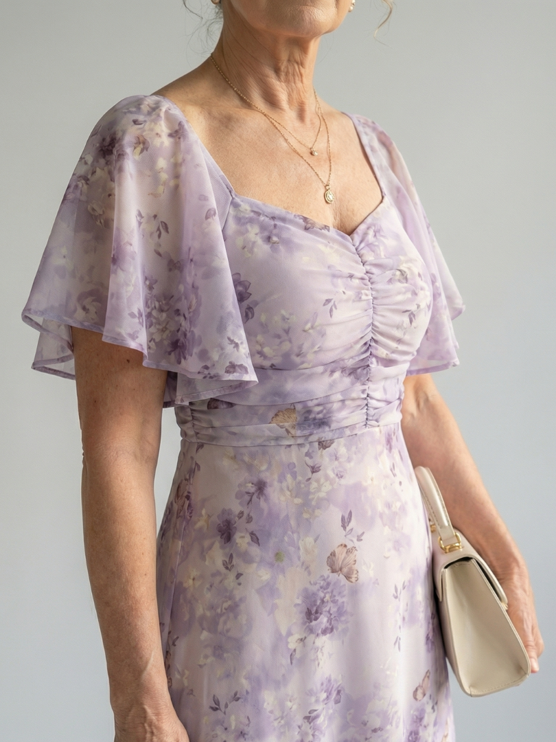 Floral lilac midi dress with ruched bodice and flutter sleeve detail