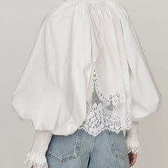 White lace blouse back view with gathered high neck and scalloped lace panel