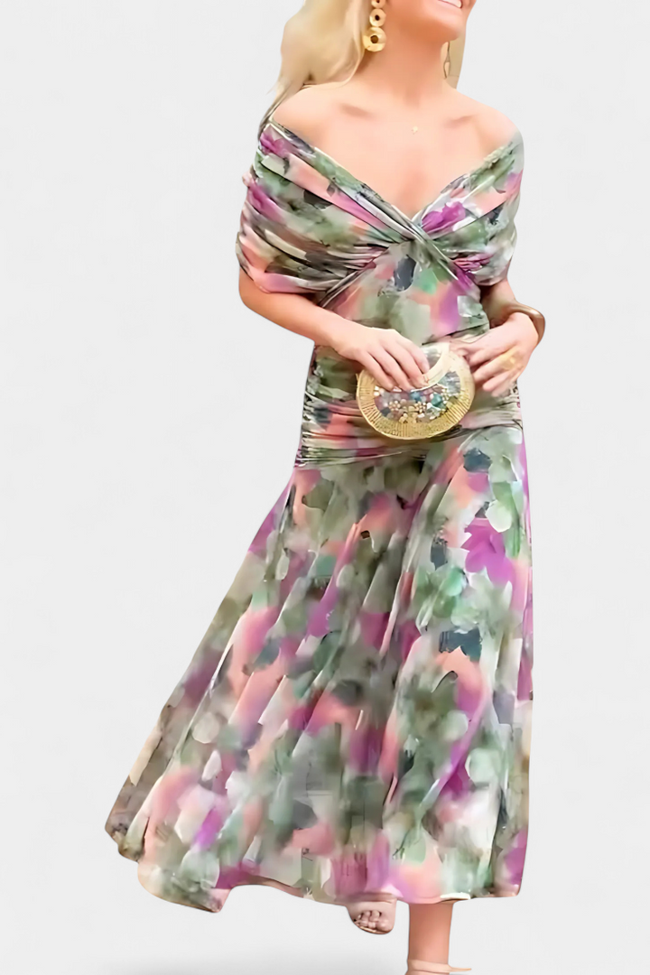 Long multicolor floral dress with off-shoulder twist top and flowing pleated skirt