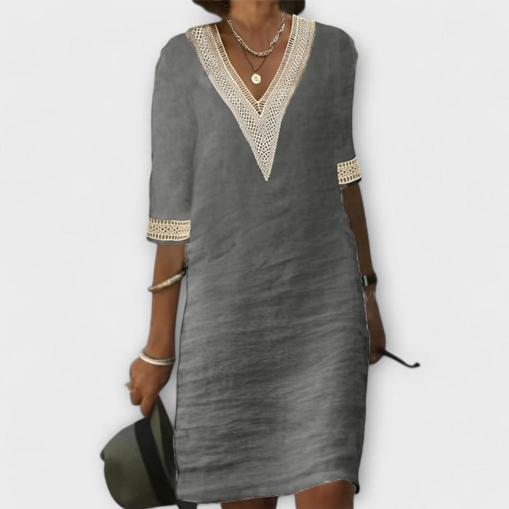 Elegant dress in gray with V-neck mesh trim and 3/4 sleeves
