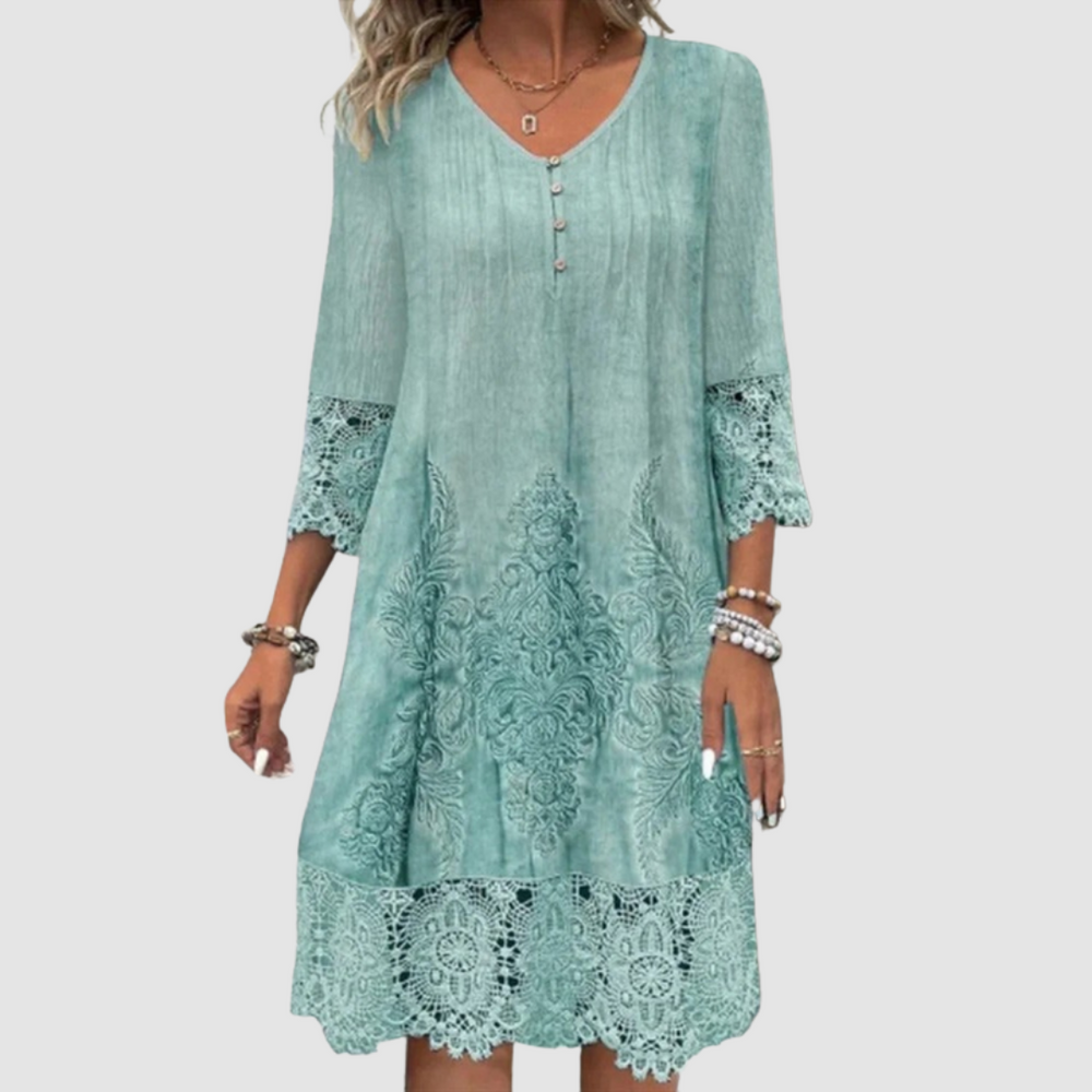 Jacquelin™ elegant lace dress in green, 3/4 sleeves with lace trim hem