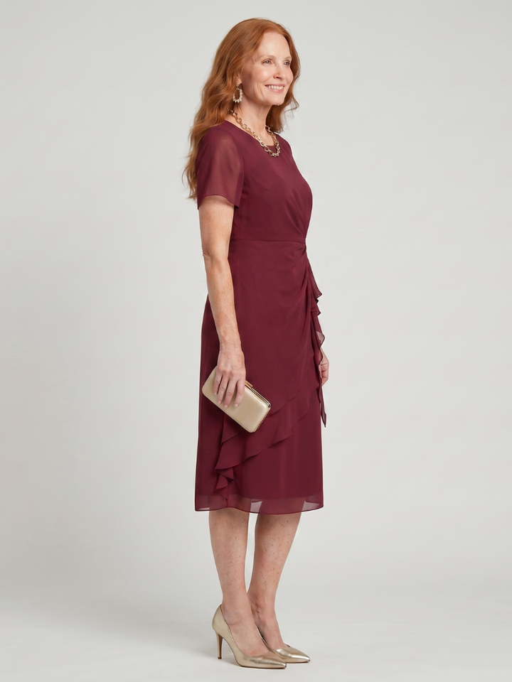 Burgundy midi dress with short sleeves and cascading side ruffle detail
