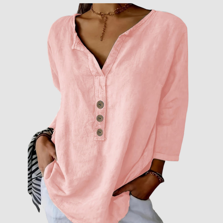 Pink cotton-linen blouse with V-neck, three-button placket, and 3/4 sleeves