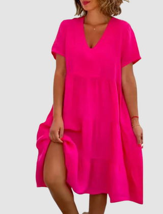 Pink V-neck short-sleeve soft dress with tiered, flowy A-line skirt