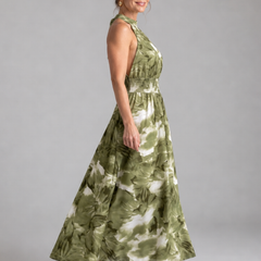 Green abstract print halter midi dress with gathered waist and flowy skirt