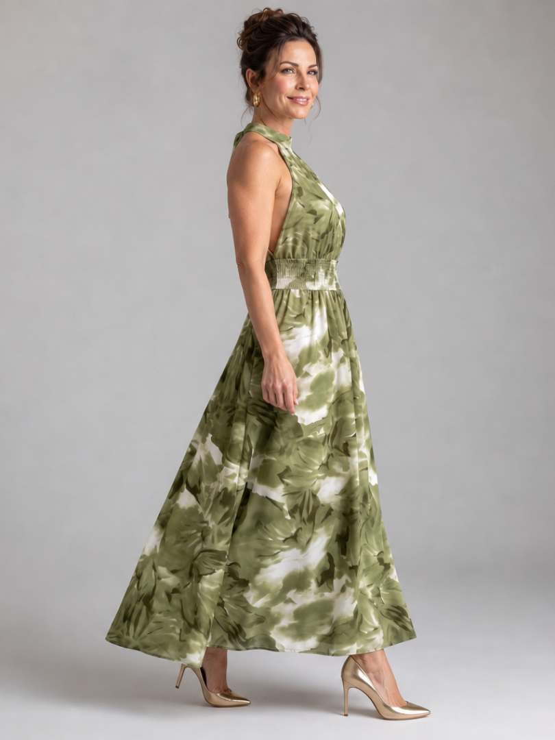 Green abstract print halter midi dress with gathered waist and flowy skirt