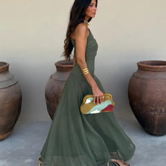 Toledo maxi dress in deep green, side view with off-shoulder neckline and full skirt