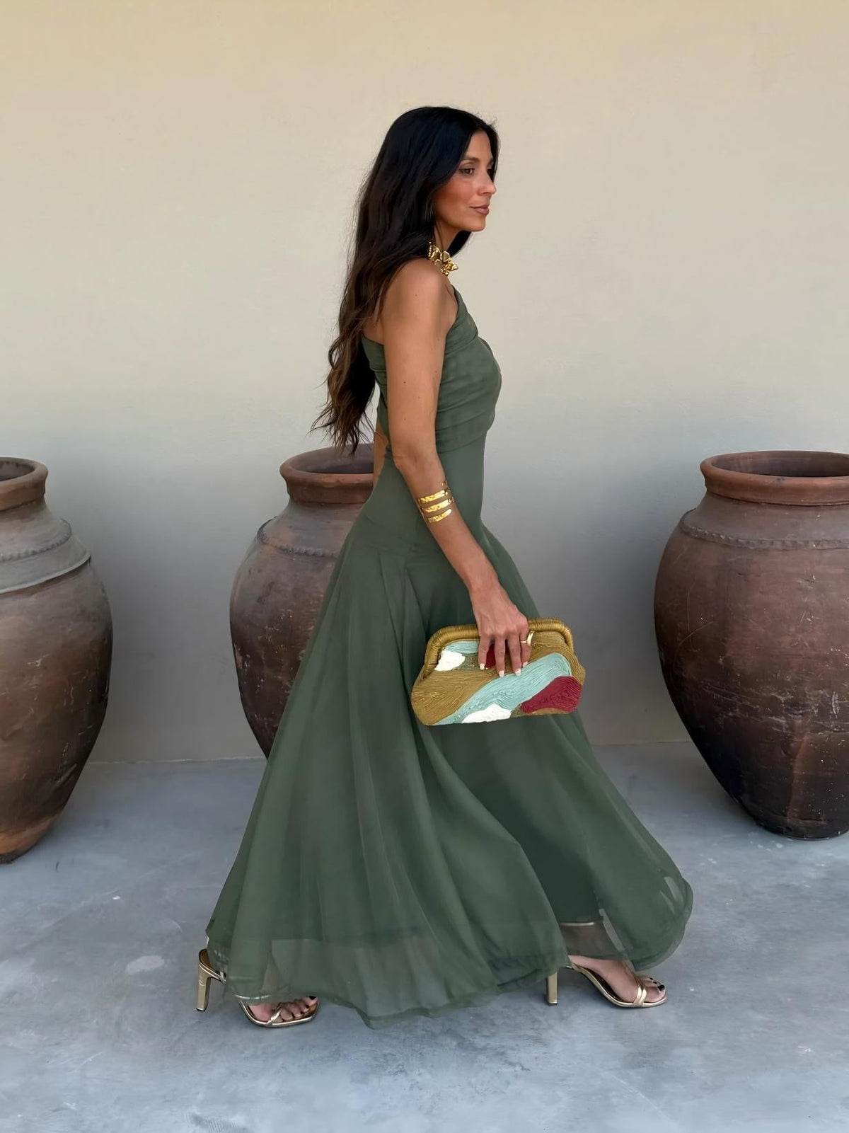 Toledo maxi dress in deep green, side view with off-shoulder neckline and full skirt