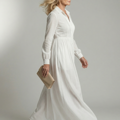 White soft flow maxi dress with V-neck, long sleeves, gathered skirt and flowing hem