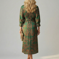Dark green wrap midi dress with long sleeves and allover pattern, tied waist