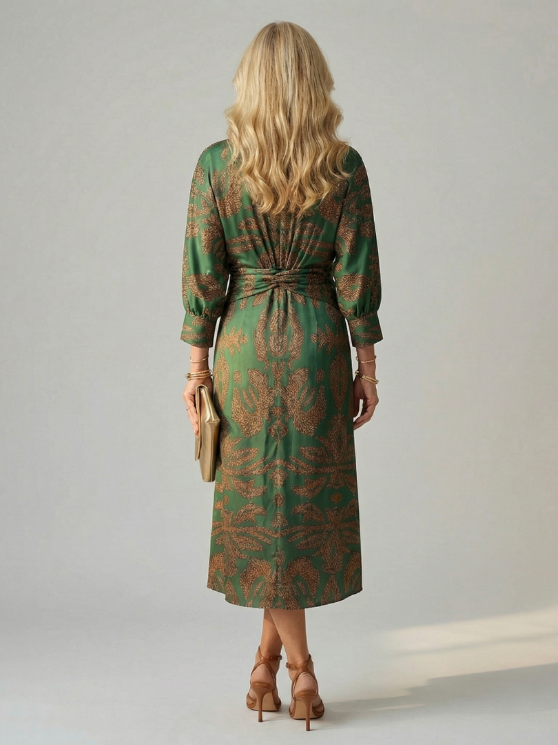Dark green wrap midi dress with long sleeves and allover pattern, tied waist
