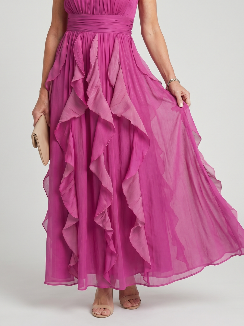 Pink layered ruffle maxi dress with high neckline and gathered waist seam detail